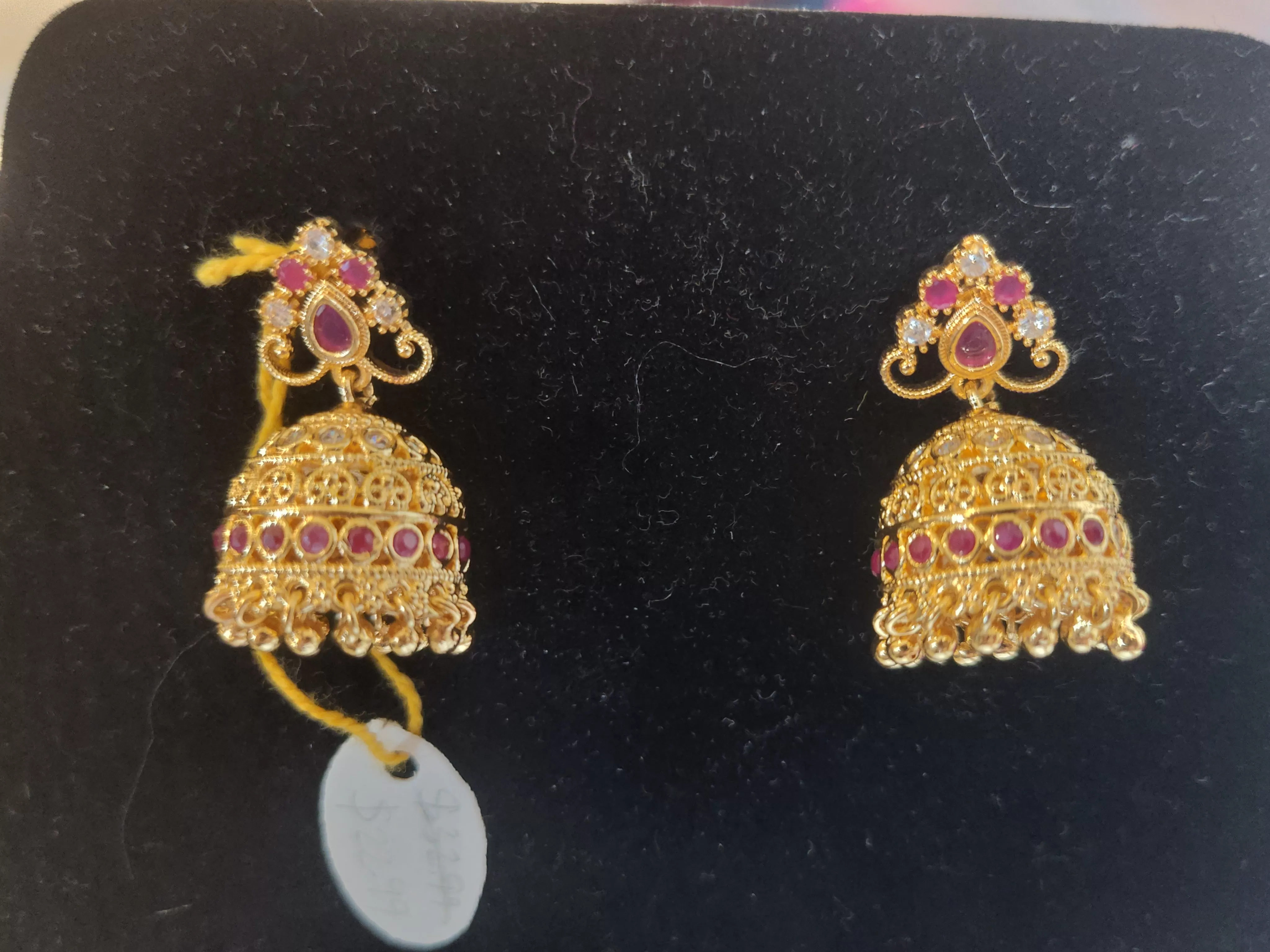 Attractive Gold Plated Jhumkha Earrings  With Pink Stones